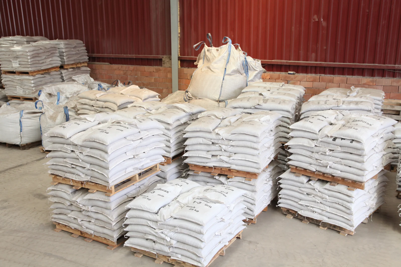 Bags of material stacked on pallets